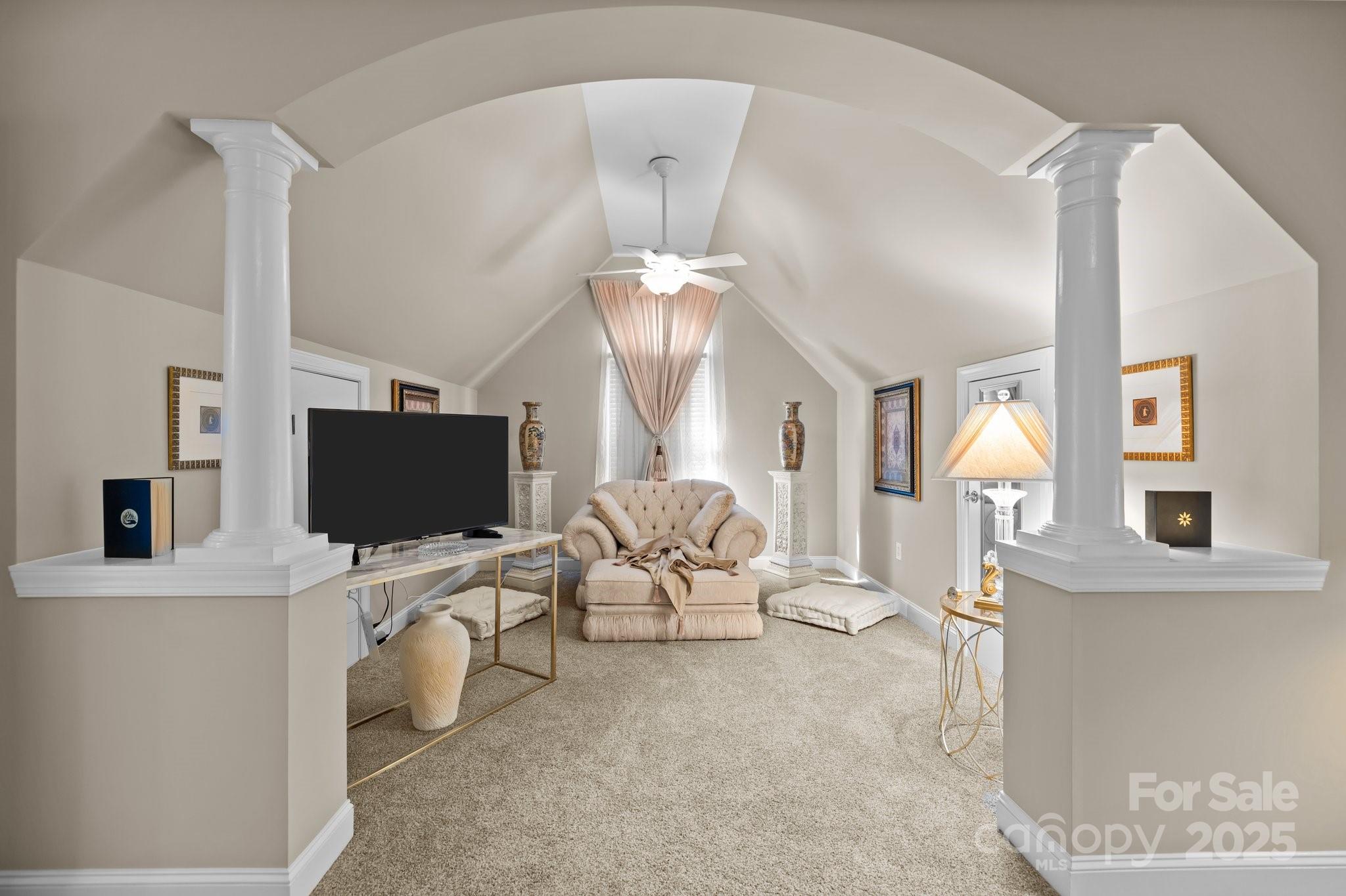 204 Limerick Drive Matthews, NC 28104 - Photo 23 of 44 a living room with furniture and a flat screen tv