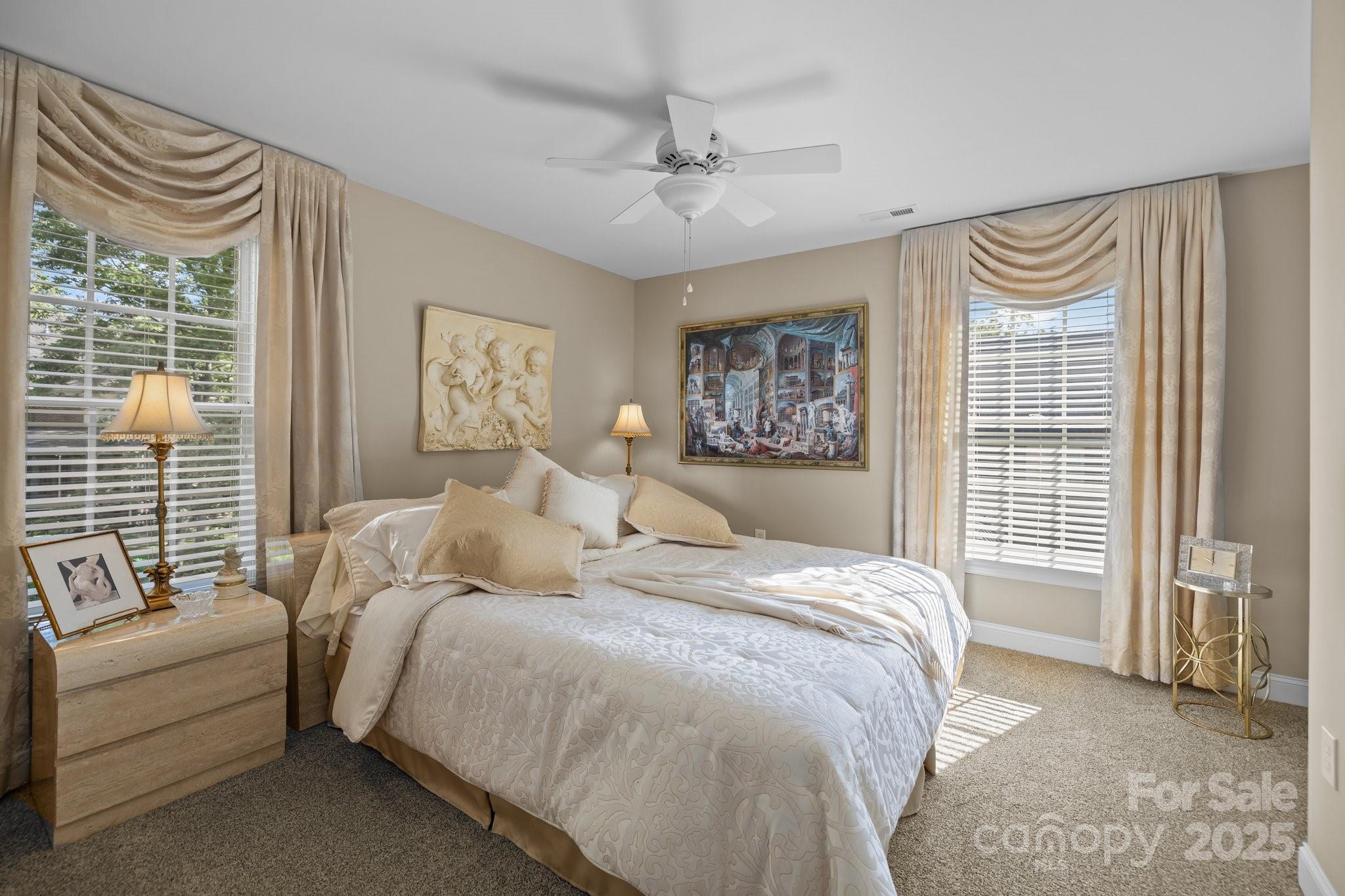 204 Limerick Drive Matthews, NC 28104 - Photo 31 of 44 a bed room with a bed and a couch