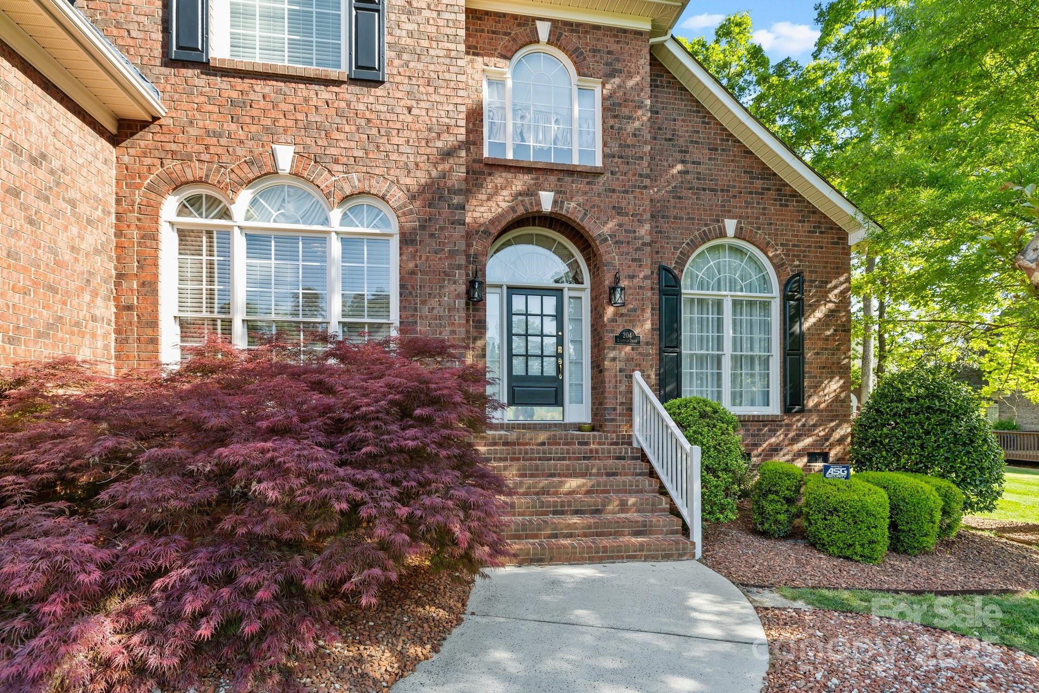 204 Limerick Drive Matthews, NC 28104 - Photo 34 of 44 a front view of a house