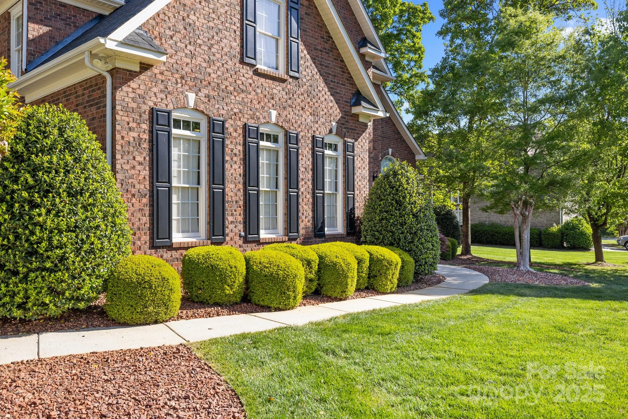204 Limerick Drive Matthews, NC 28104 - Photo 35 of 44 a view of a house with backyard and sitting area