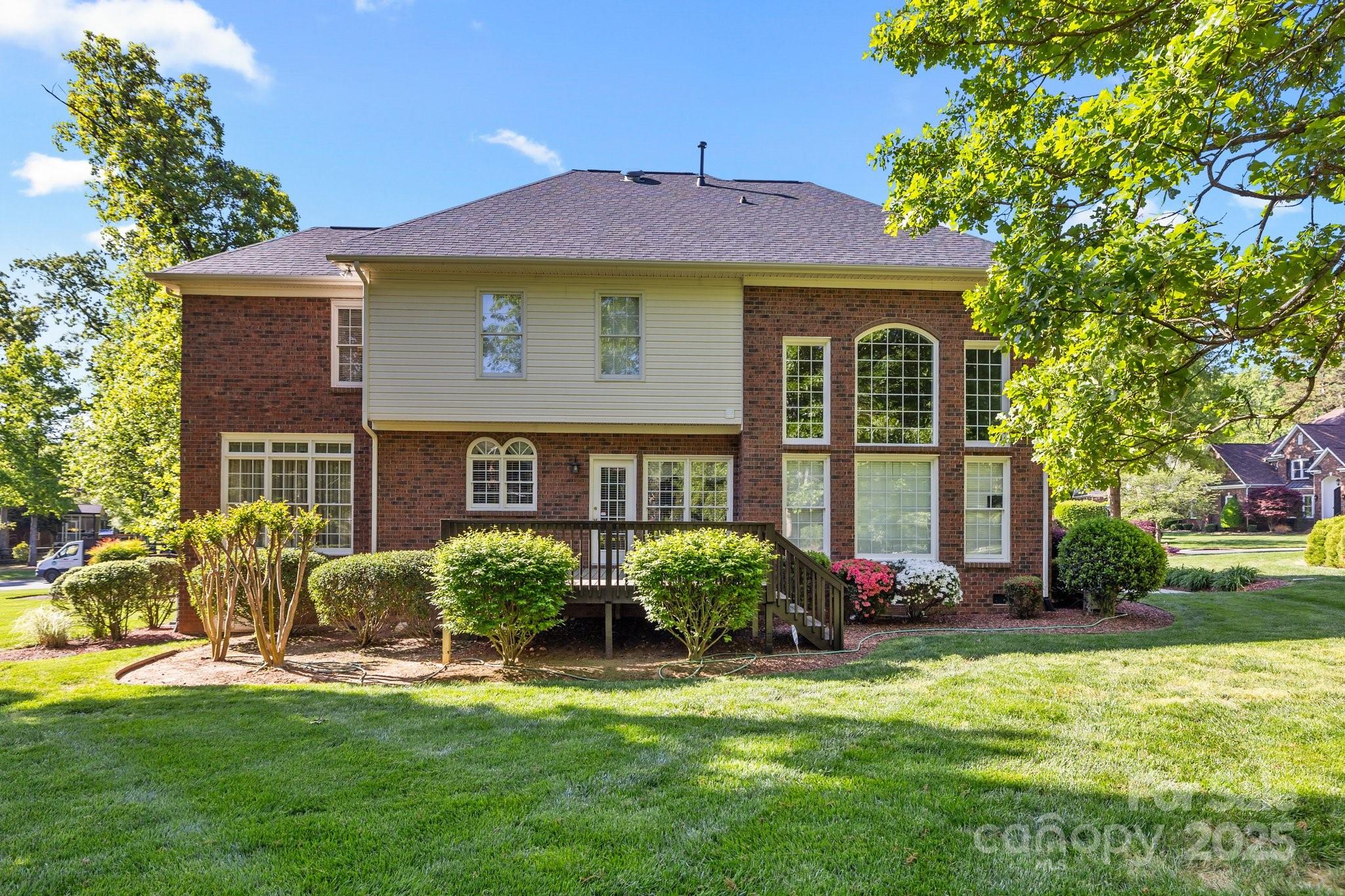 204 Limerick Drive Matthews, NC 28104 - Photo 37 of 44 a front view of a house with garden
