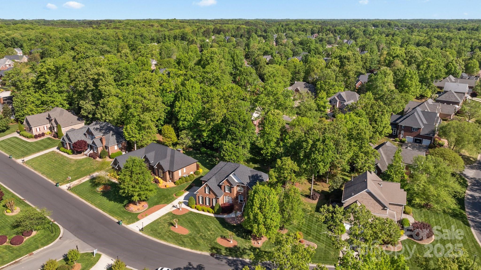 204 Limerick Drive Matthews, NC 28104 - Photo 41 of 44 an aerial view of a house with a yard