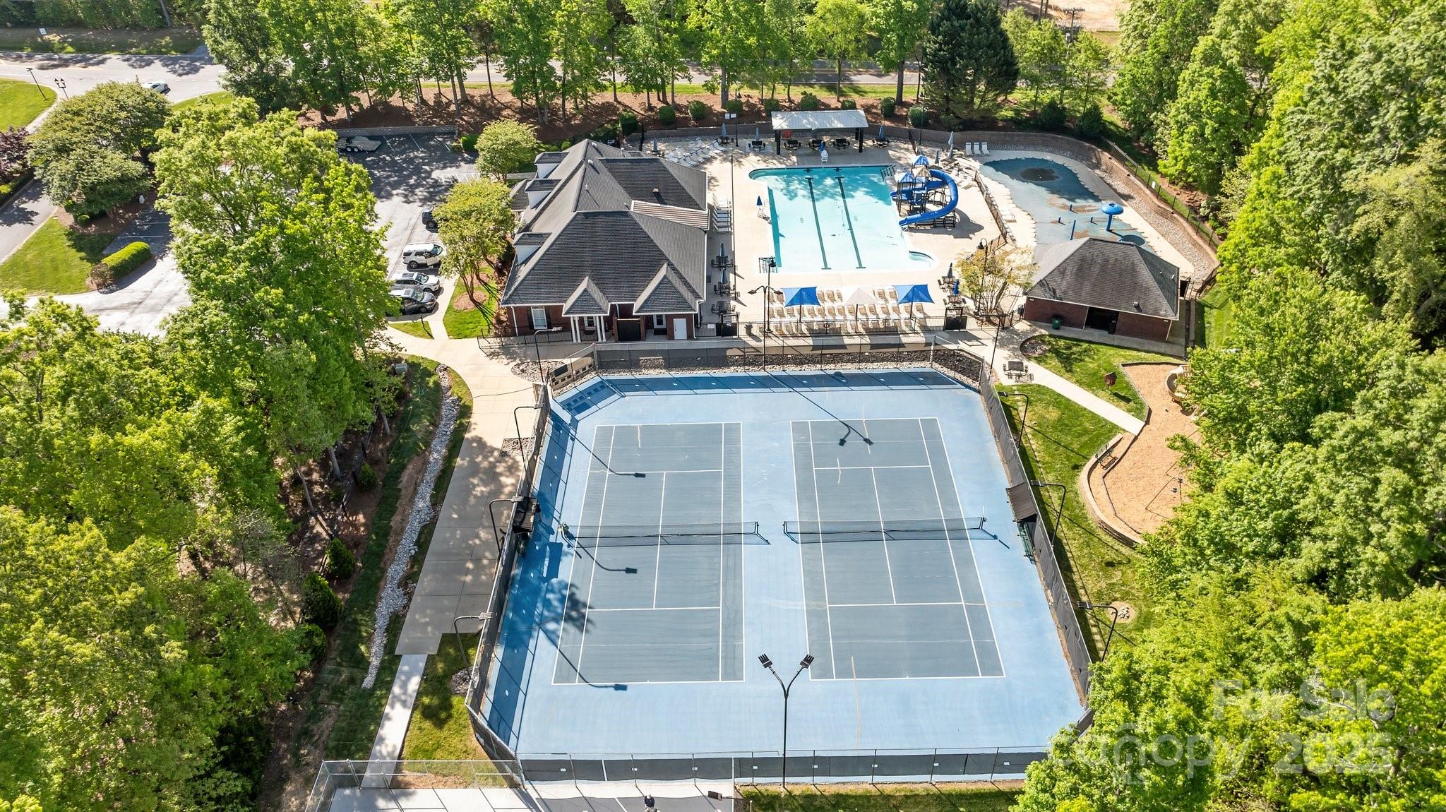 204 Limerick Drive Matthews, NC 28104 - Photo 42 of 44 a aerial view of a residential apartment building with a yard