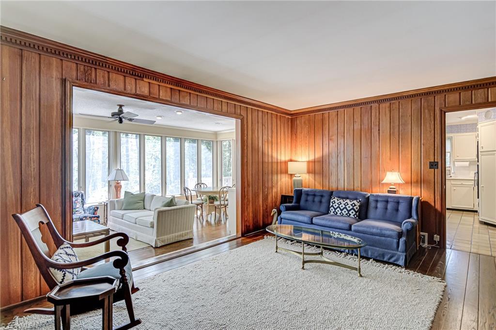 3530 Kirklees Road Winston-Salem, NC 27104 - Photo 11 of 42 Den opens onto sunroom