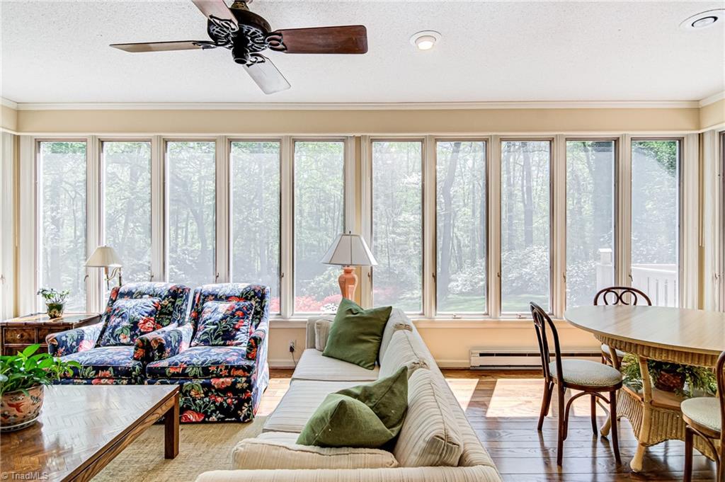 3530 Kirklees Road Winston-Salem, NC 27104 - Photo 15 of 42 Wall of floor to ceiling windows lets the light in