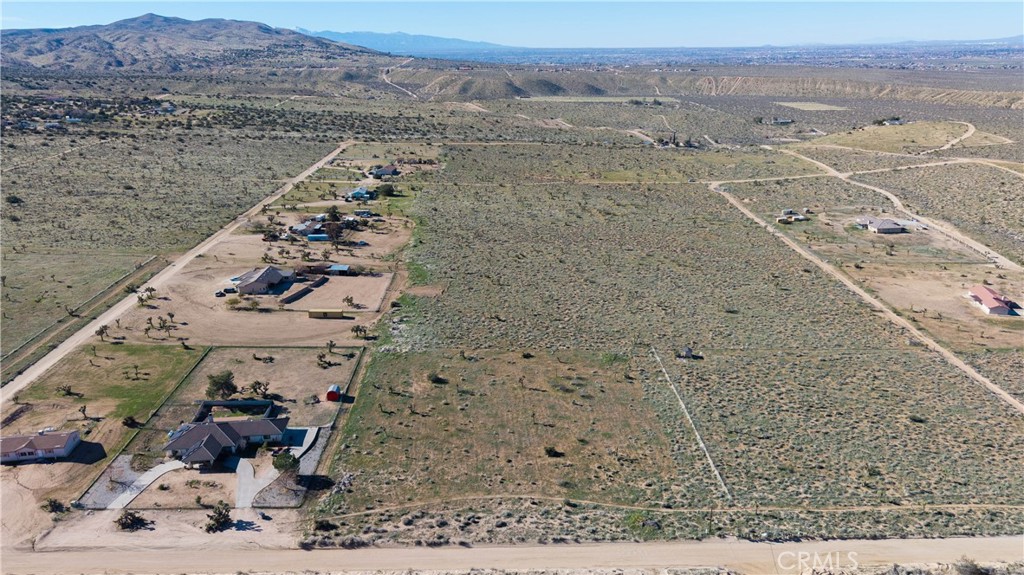 9588 Milpas Road Apple Valley, CA 92308 - Photo 16 of 22 a view of a terrace with sky view