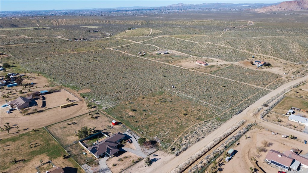 9588 Milpas Road Apple Valley, CA 92308 - Photo 17 of 22 an aerial view of residential houses with outdoor space