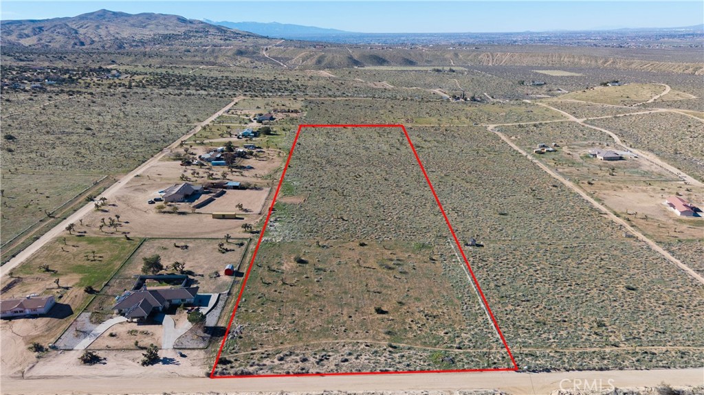 9588 Milpas Road Apple Valley, CA 92308 - Photo 2 of 22 a view of an ocean beach