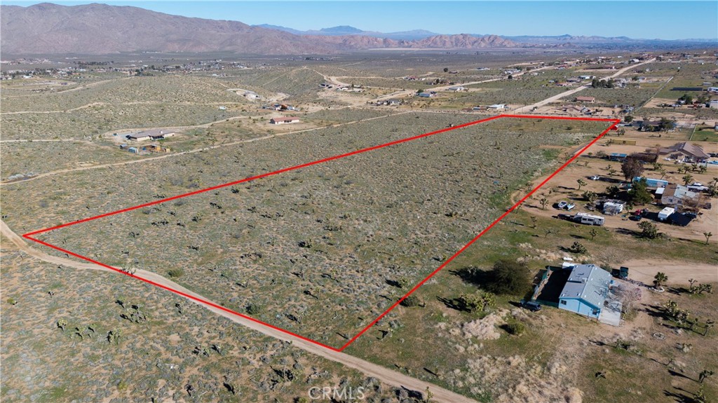 9588 Milpas Road Apple Valley, CA 92308 - Photo 8 of 22 a view of a sky from a terrace