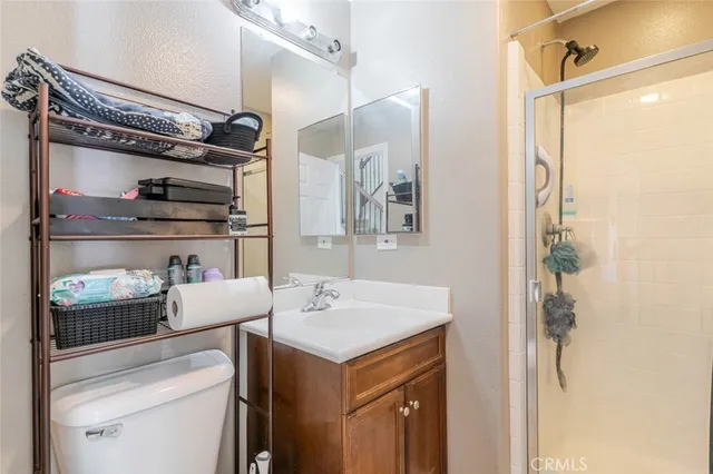 a view of storage and utility room with washer and dryer