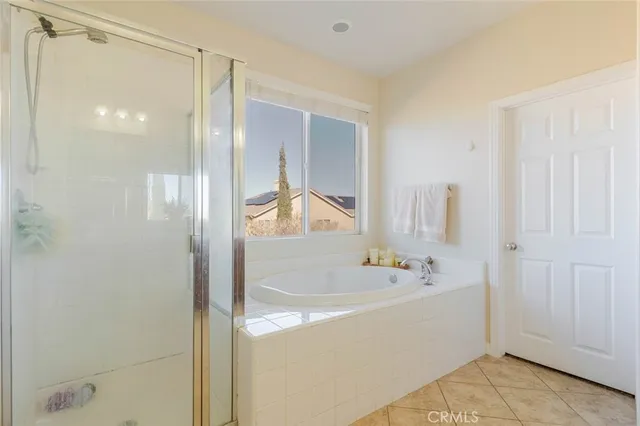 a bathroom with a bathtub and a sink