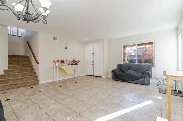 a view of livingroom with furniture and windows