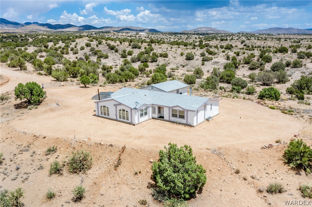 10551 East Blake Ranch Road Kingman, AZ 86401 - Photo 38 of 50 an aerial view of a house with a yard