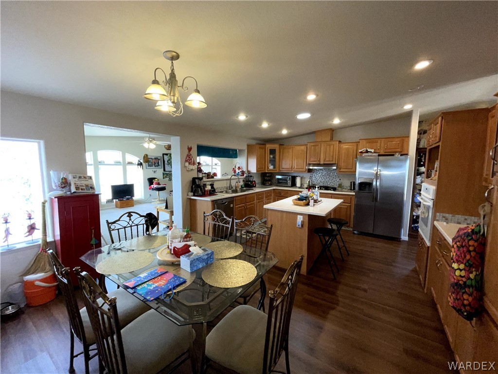 10551 East Blake Ranch Road Kingman, AZ 86401 - Photo 6 of 50 a view of a dining room with furniture