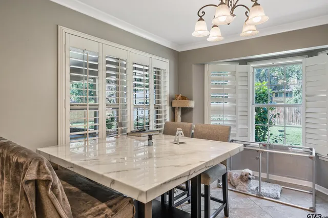 a dining room with wooden floor