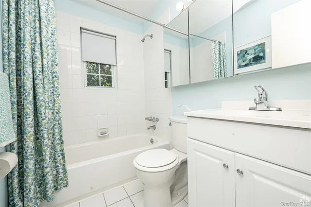 a bathroom with a sink a toilet and a bathtub