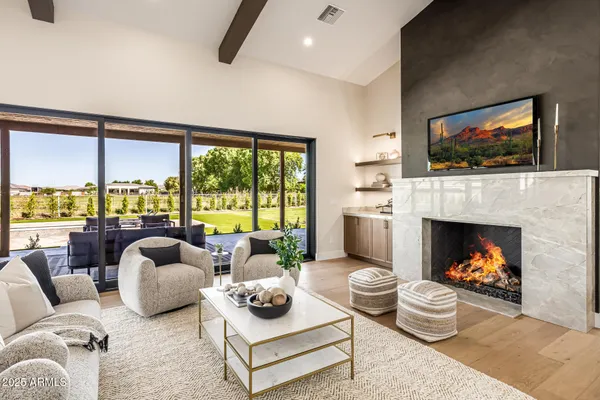 a kitchen with a sink a counter top space and stainless steel appliances