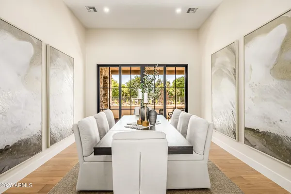 a open kitchen with stainless steel appliances granite countertop a stove and a refrigerator