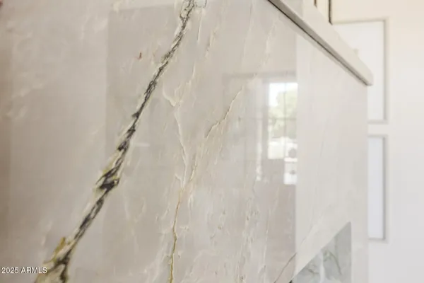 a bathroom with a sink double vanity and a mirror