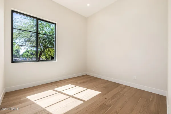 a view of a patio with a table chairs and a patio