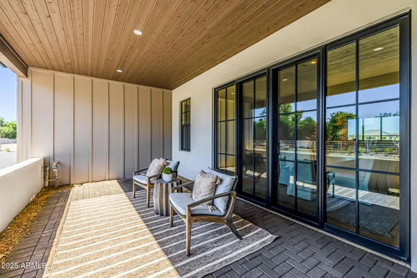 a view of hallway with chandelier