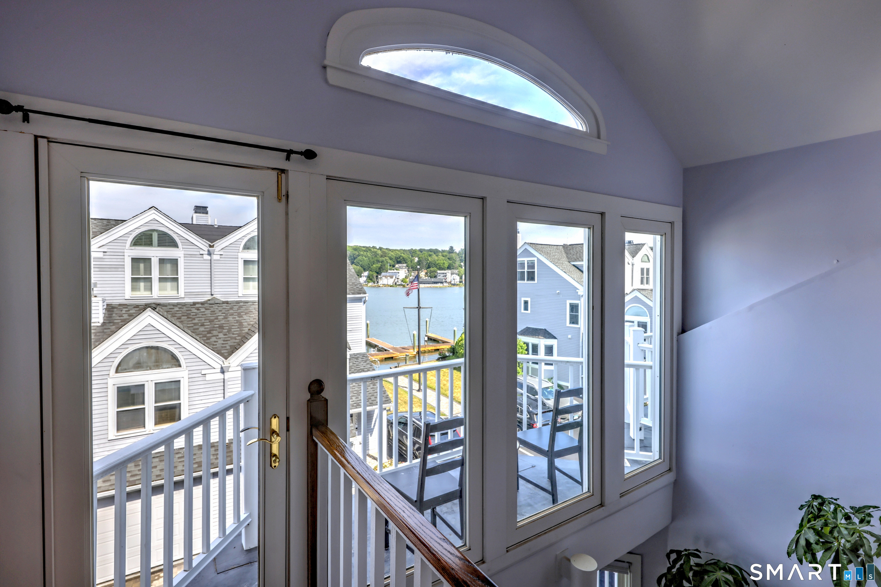 229 Front Street, Unit 1 New Haven, CT 06513 - Photo 24 of 39 Entry to the top deck from the loft and view of the river.