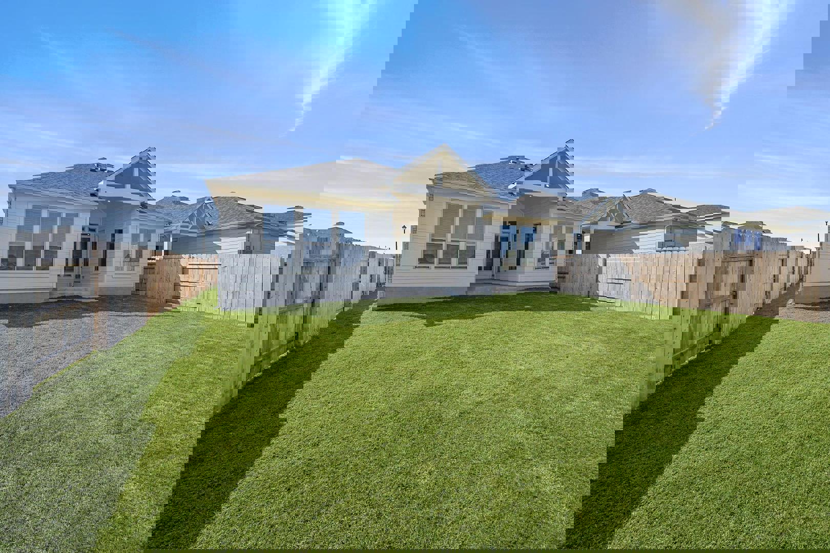 429 Brandywine Road Hutto, TX 78634 - Photo 23 of 28 a front view of a house with a garden and yard