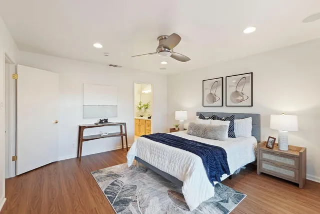 a view of a balcony with table and chairs