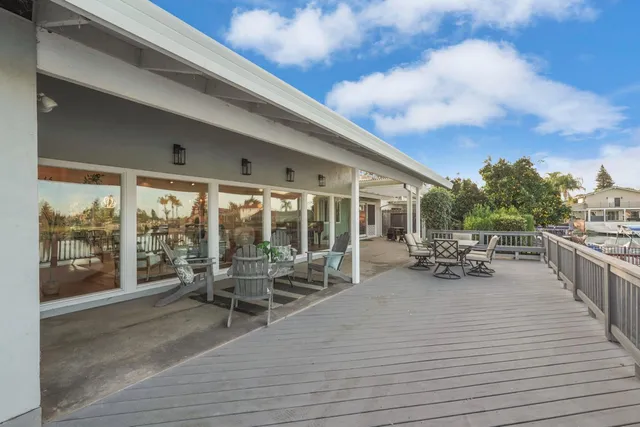 a view of a lake with boats and trees