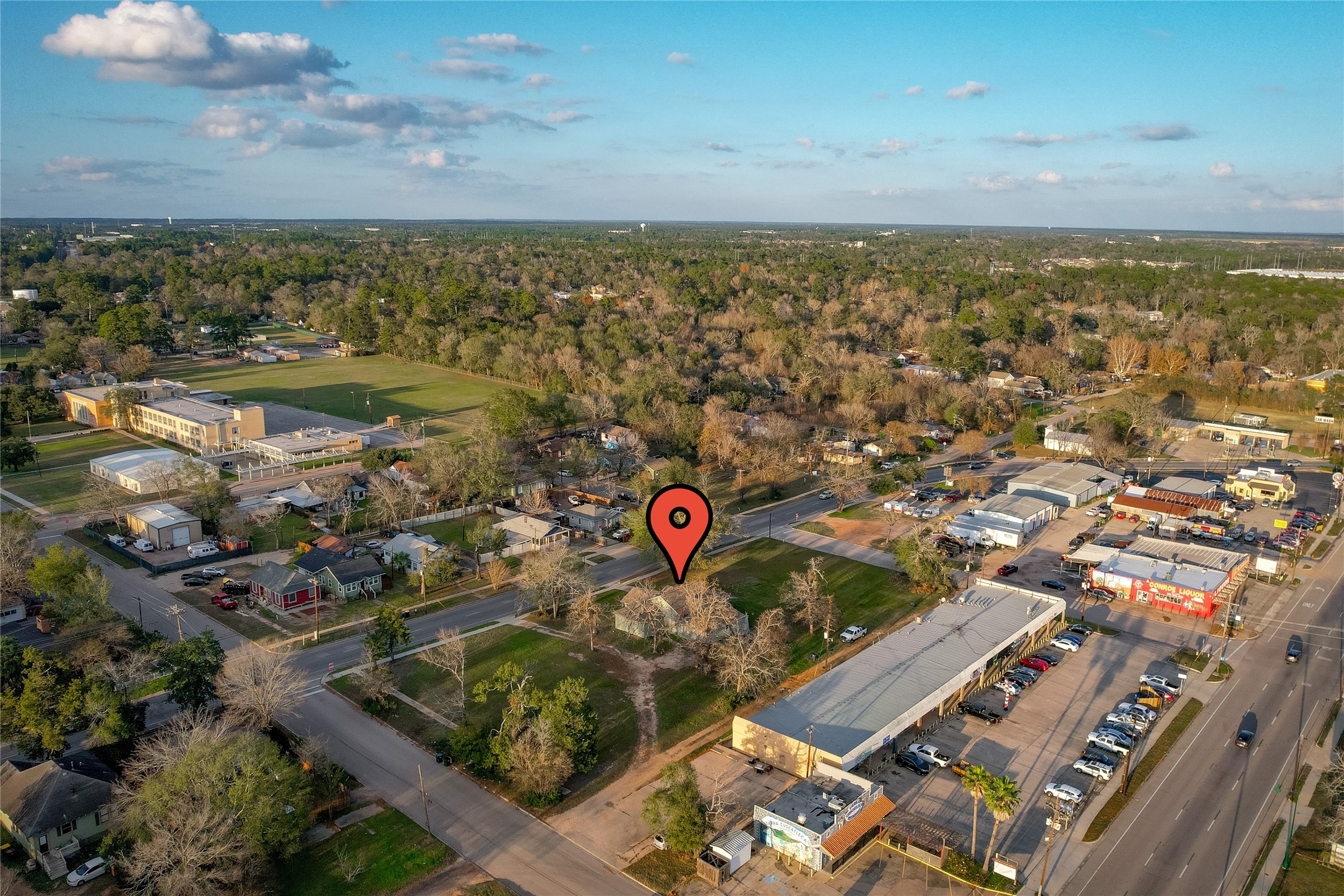 309 East Phillips Street Conroe, TX 77301 - Photo 5 of 10 an aerial view of a city
