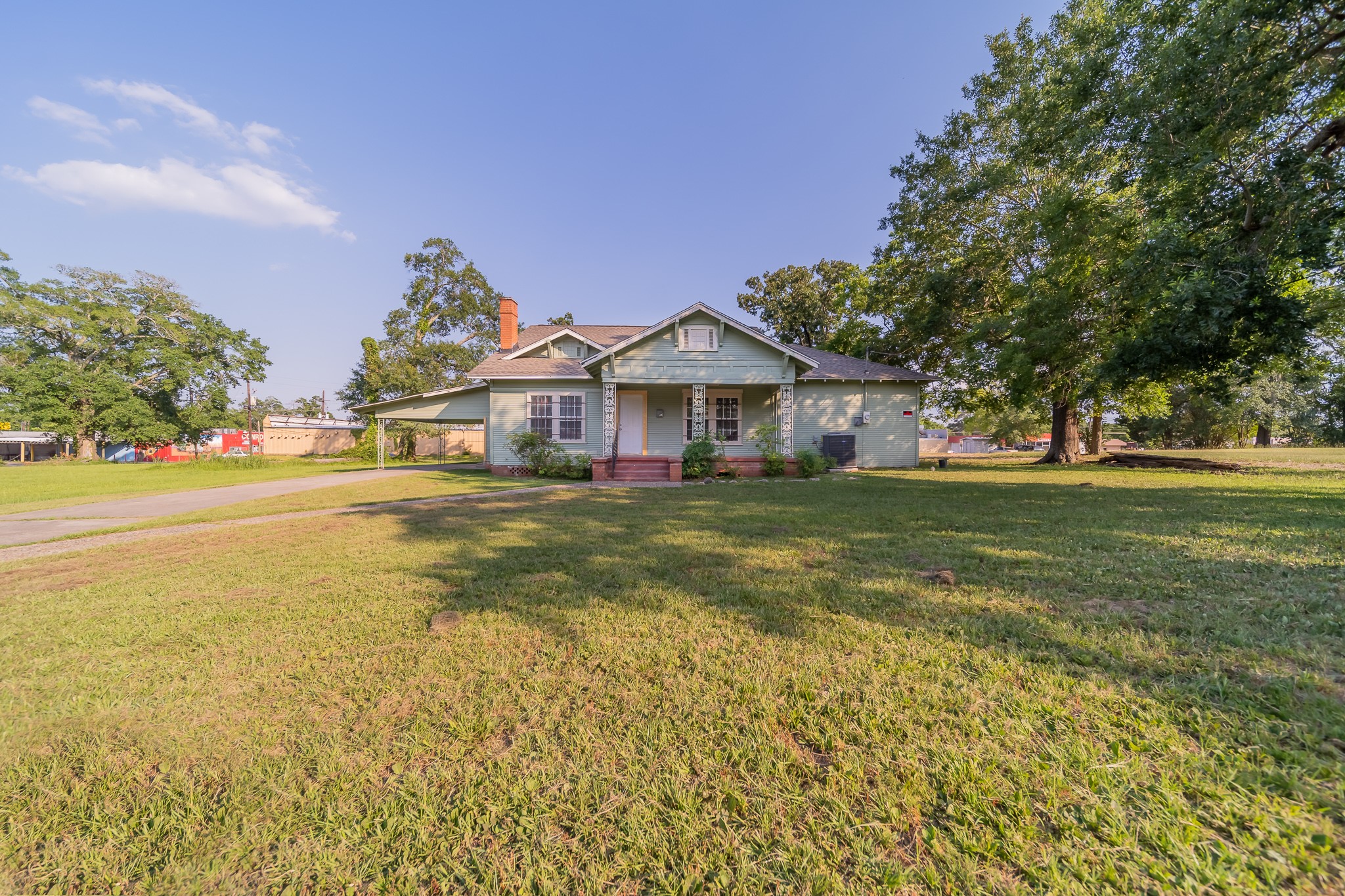 309 East Phillips Street Conroe, TX 77301 - Photo 7 of 10 a front view of a house with a yard