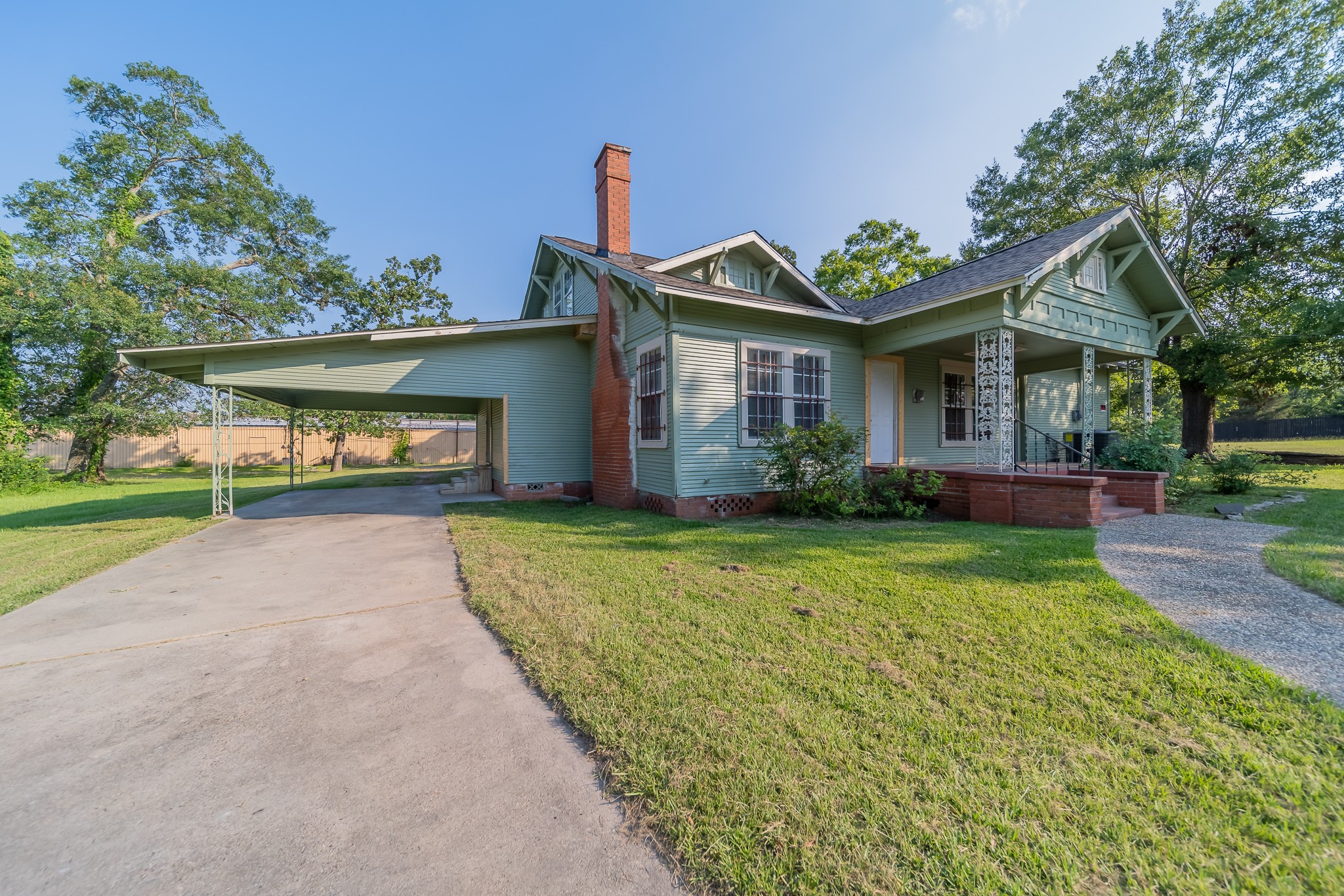309 East Phillips Street Conroe, TX 77301 - Photo 9 of 10 a front view of a house with garden