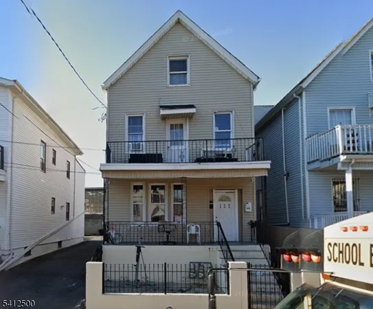 a front view of a house with a porch