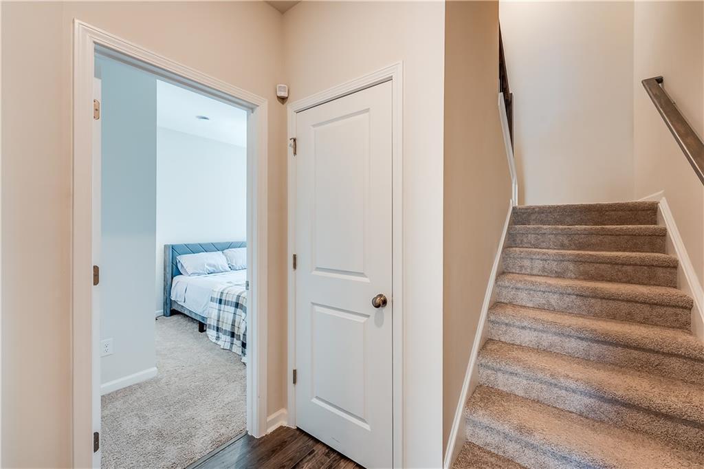 1634 Halbrook Place Southwest Marietta, GA 30008 - Photo 2 of 34 a view of bedroom with furniture and wooden floor