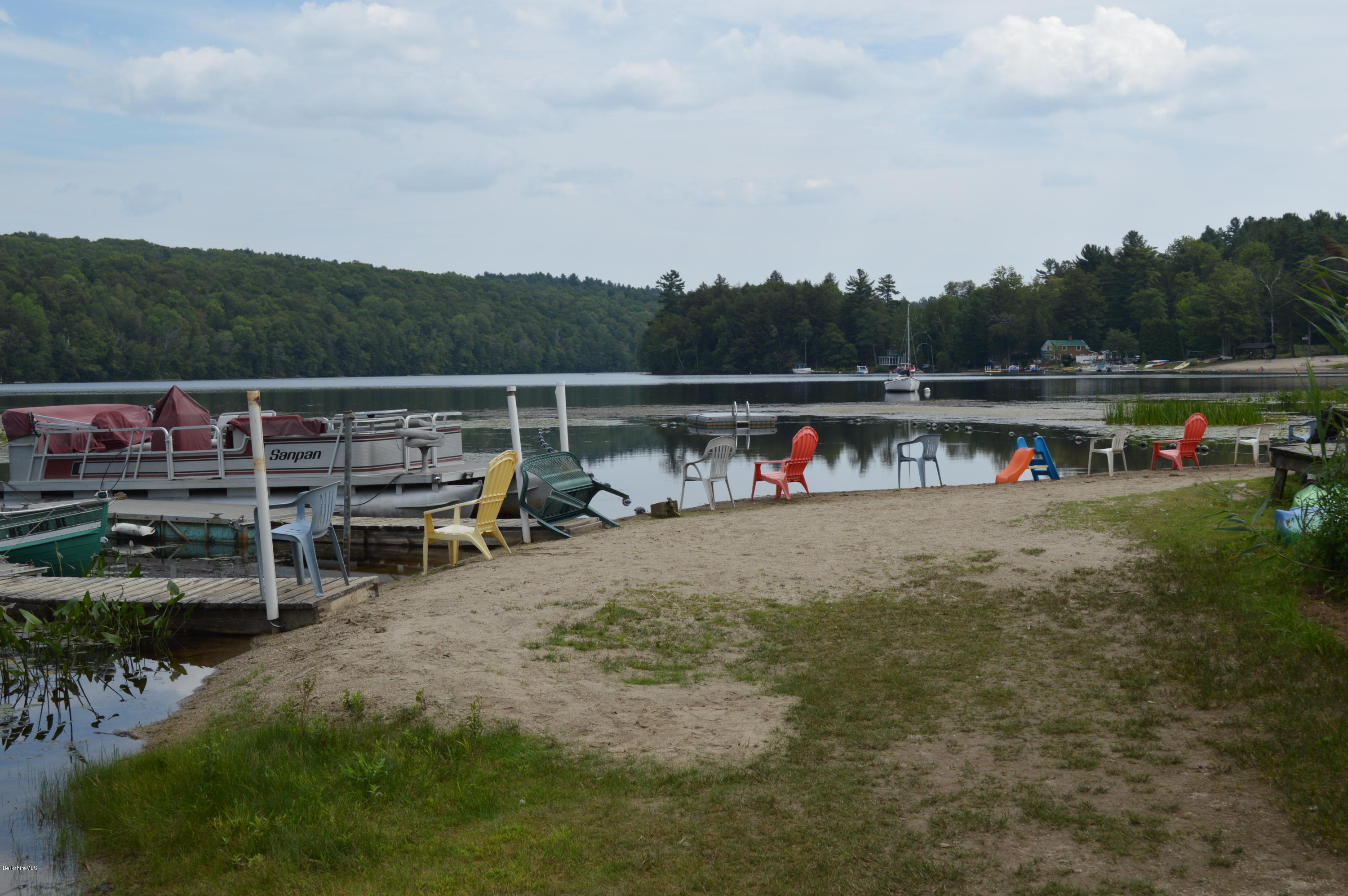 81 Peterson Road Becket, MA 01223 - Photo 20 of 24 a view of outdoor space with seating area and trees in the background