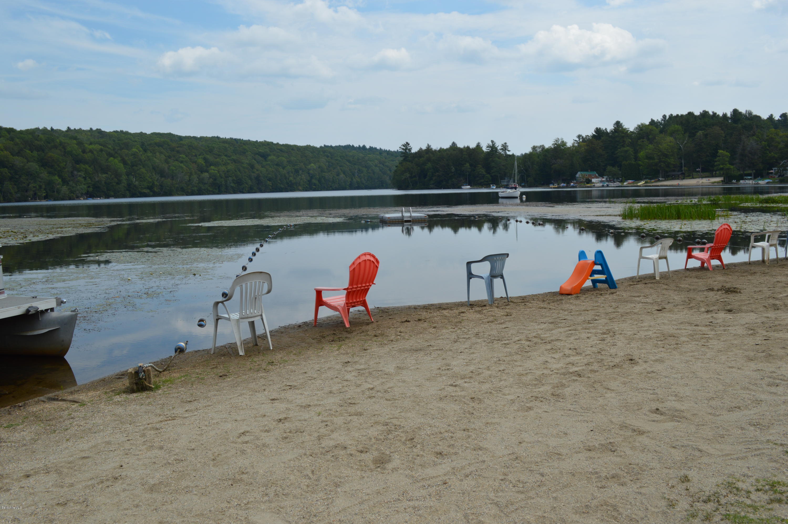 81 Peterson Road Becket, MA 01223 - Photo 21 of 24 a view of swimming pool with a lake view