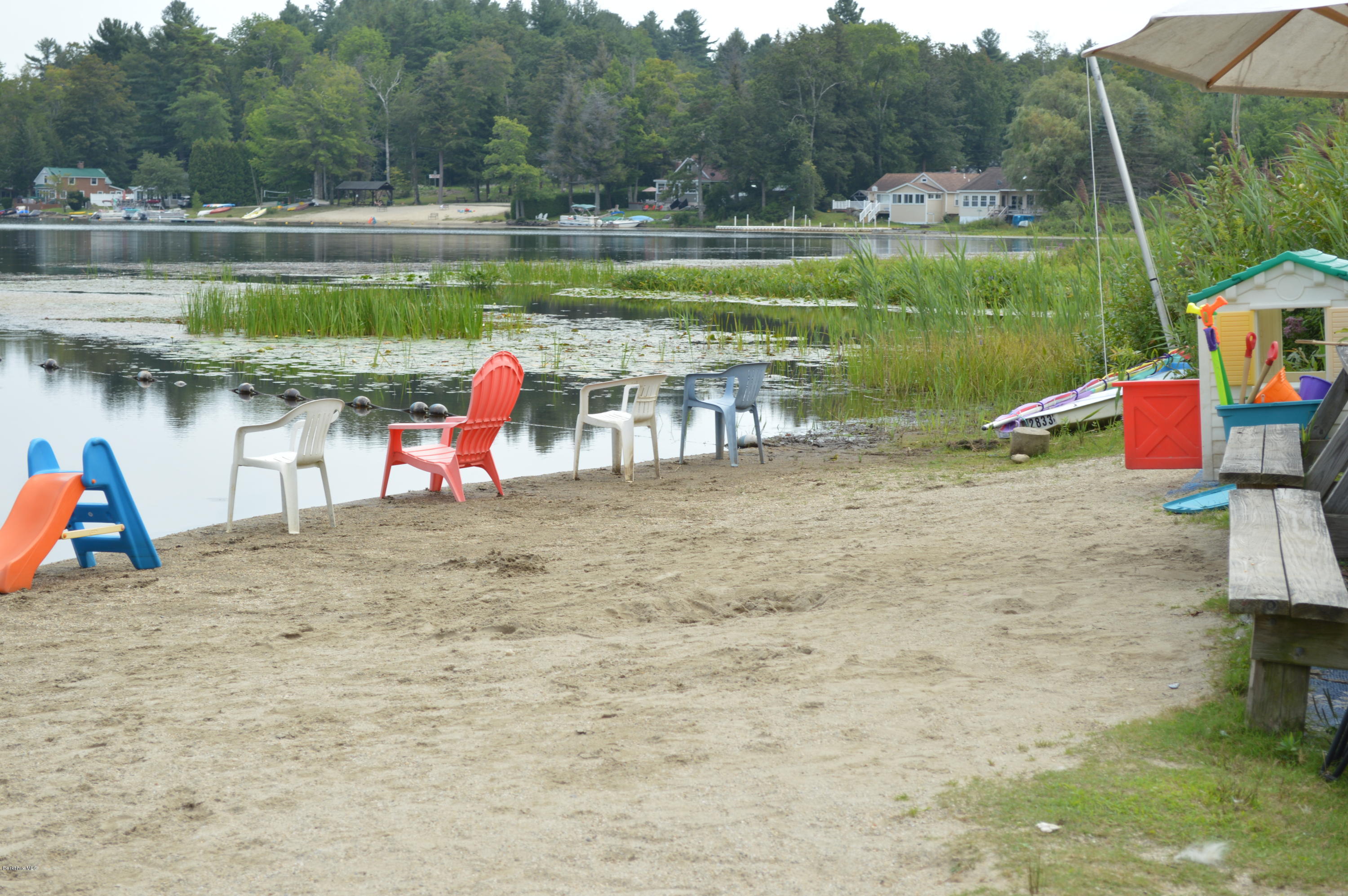 81 Peterson Road Becket, MA 01223 - Photo 22 of 24 a view of a lake with a park