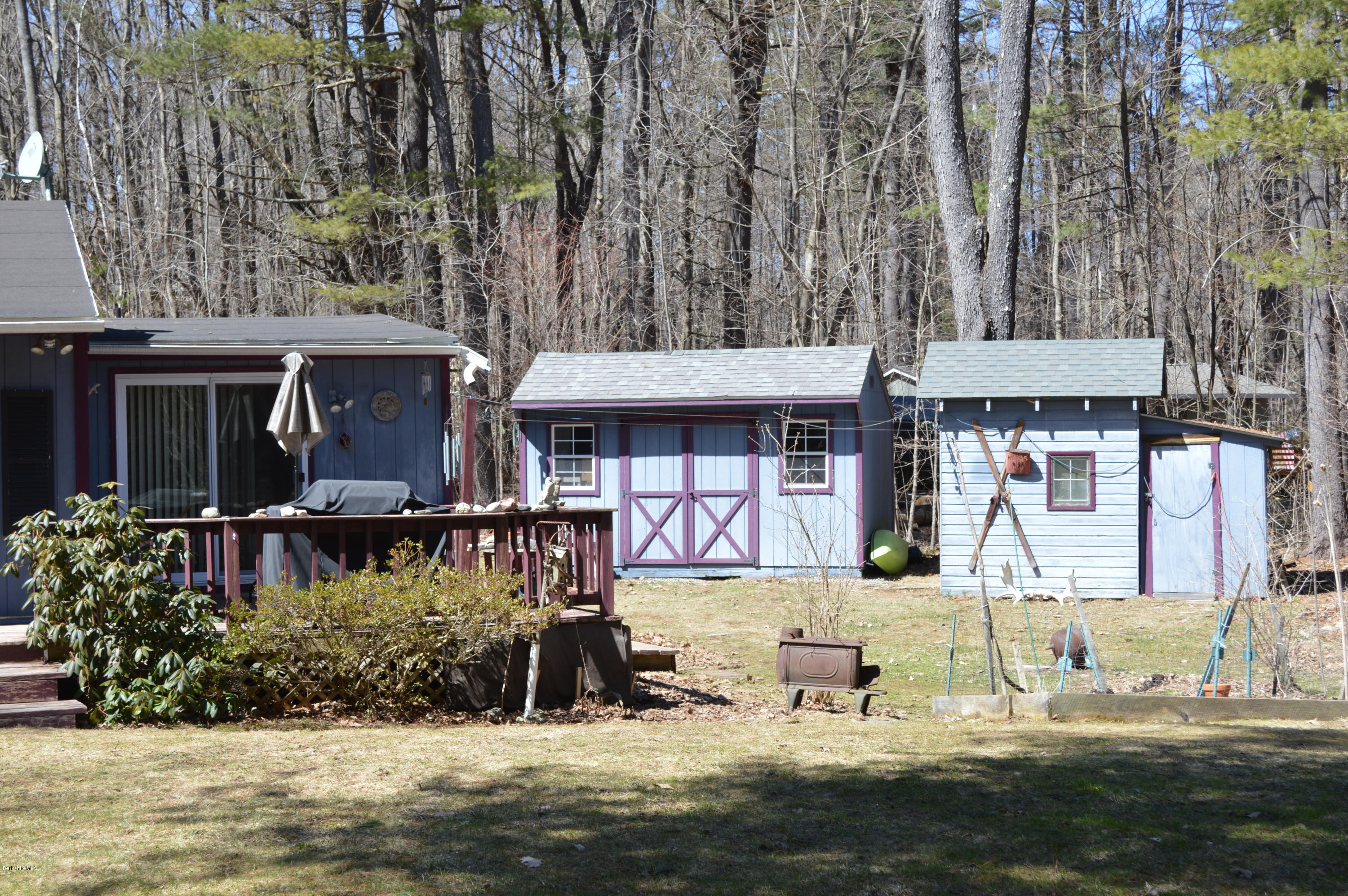 81 Peterson Road Becket, MA 01223 - Photo 8 of 24 front view of a house with a yard