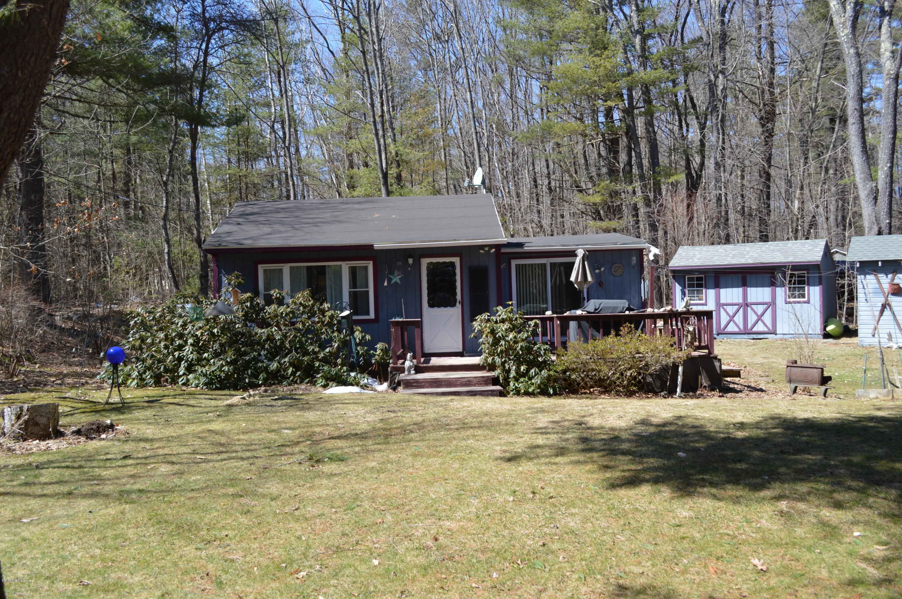 81 Peterson Road Becket, MA 01223 - Photo 9 of 24 a front view of a house with a yard