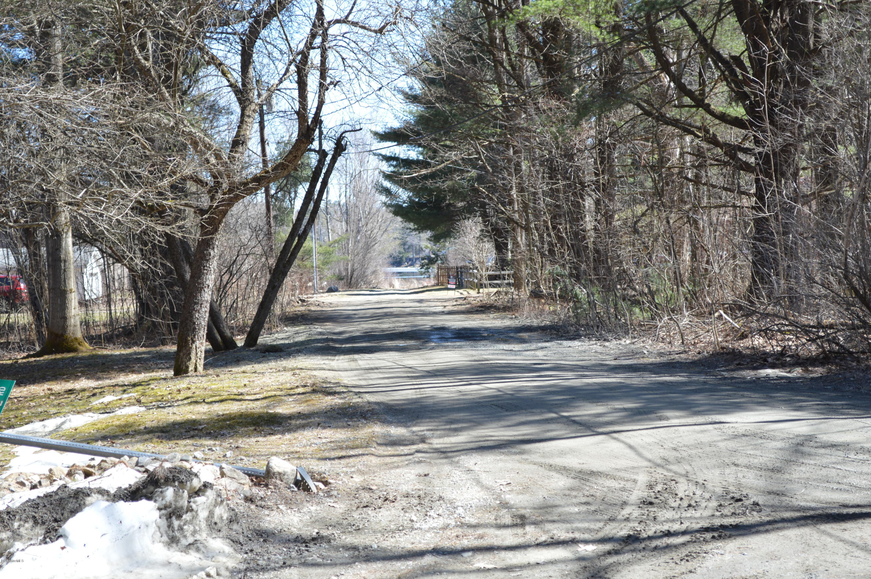 81 Peterson Road Becket, MA 01223 - Photo 10 of 24 a view of road with trees