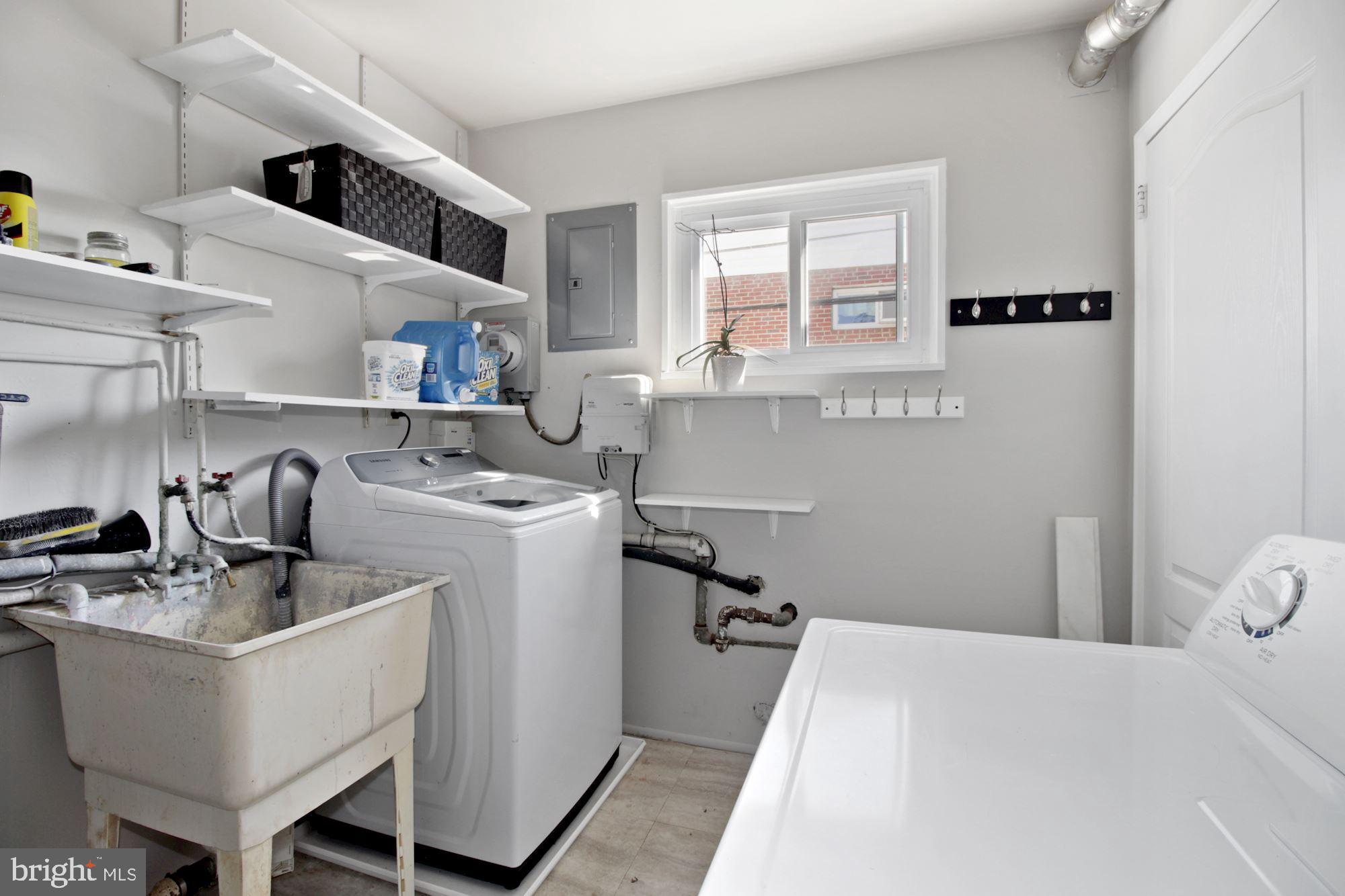 937 Vanderwood Road Baltimore, MD 21228 - Photo 21 of 28 Laundry room off kitchen with extra pantry storage