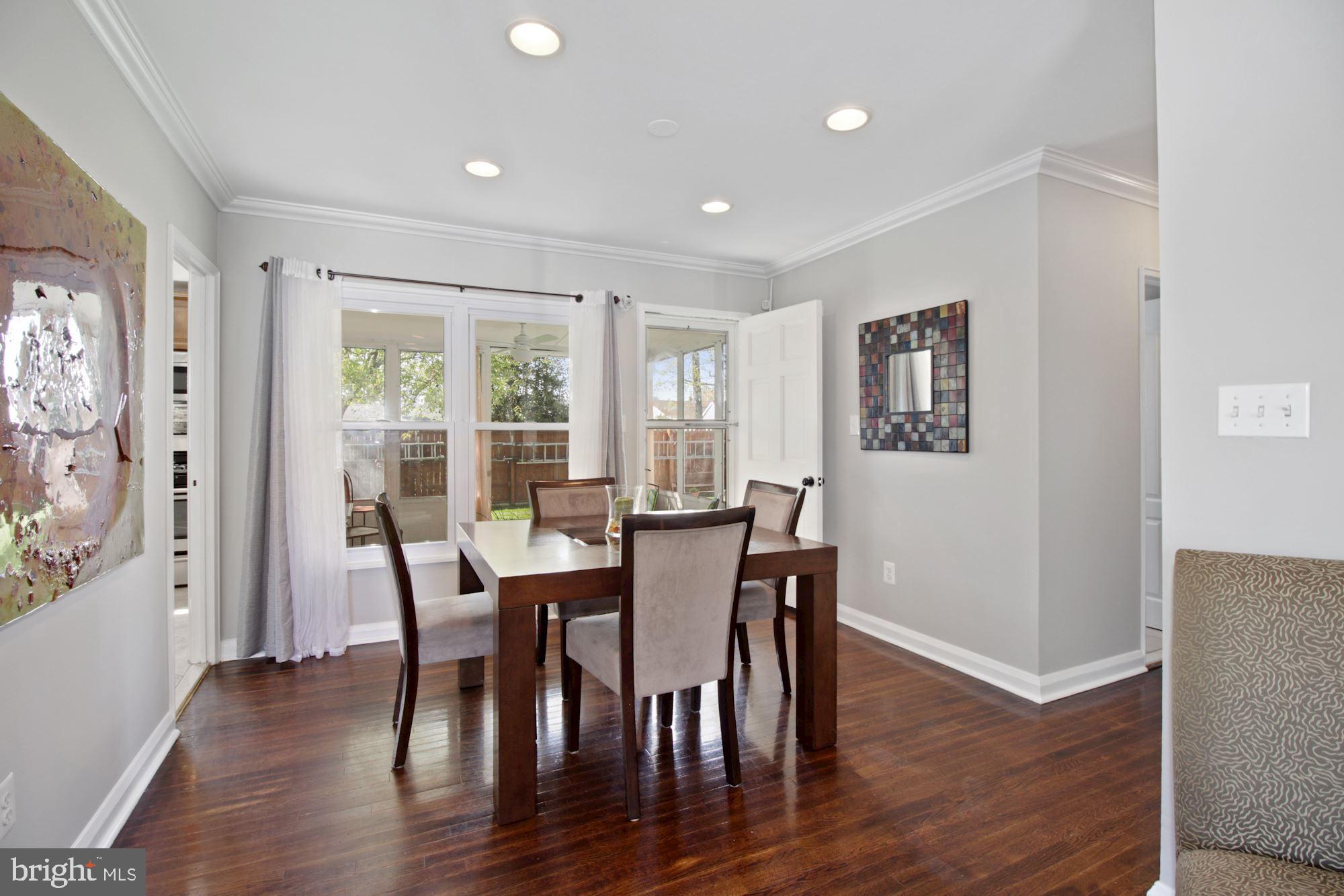 937 Vanderwood Road Baltimore, MD 21228 - Photo 6 of 28 Dining room leads out to sunporch!