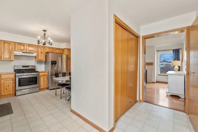 a view of a kitchen from the hallway