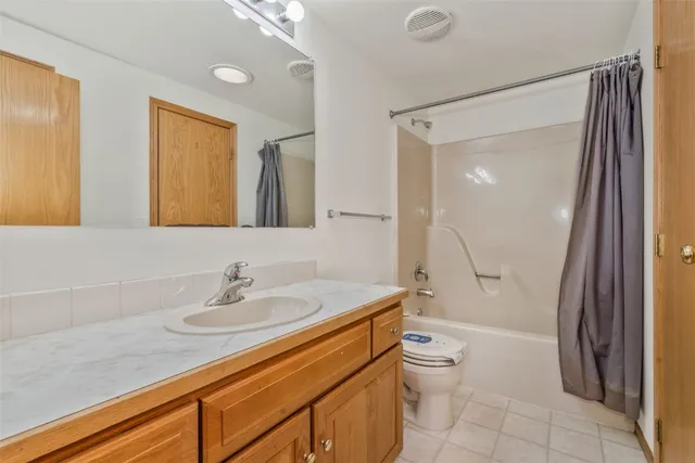 a view of a wooden house with a large window