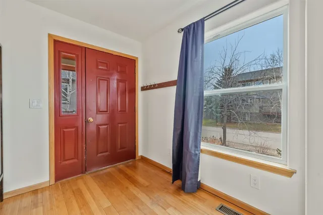 a view of a room with a large window