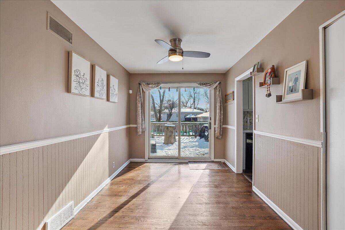3340 Maple Drive Highland, IN 46322 - Photo 11 of 29 a view of a hallway with wooden floor and a living room