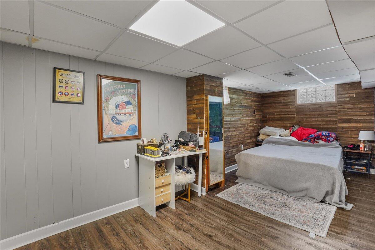 3340 Maple Drive Highland, IN 46322 - Photo 16 of 29 a bedroom with a bed and a desk