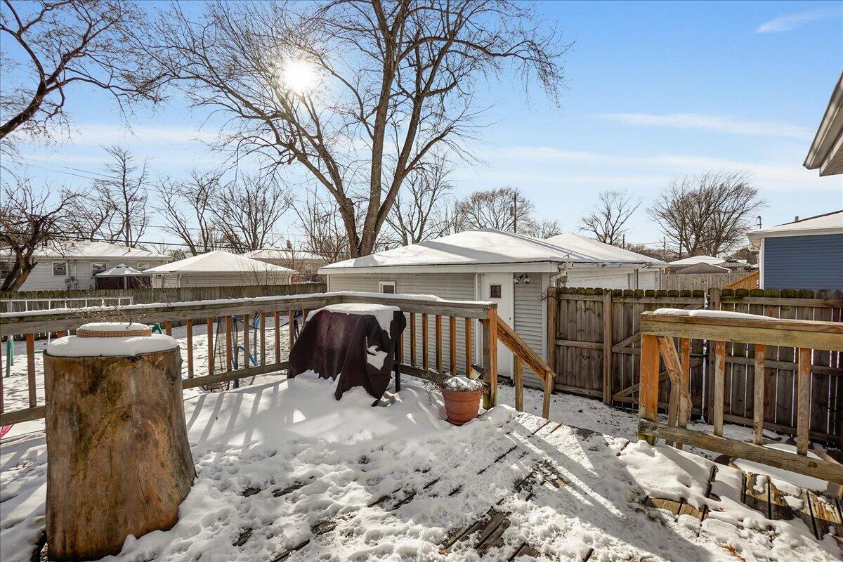 3340 Maple Drive Highland, IN 46322 - Photo 23 of 29 a view of a dinning table and chairs in patio