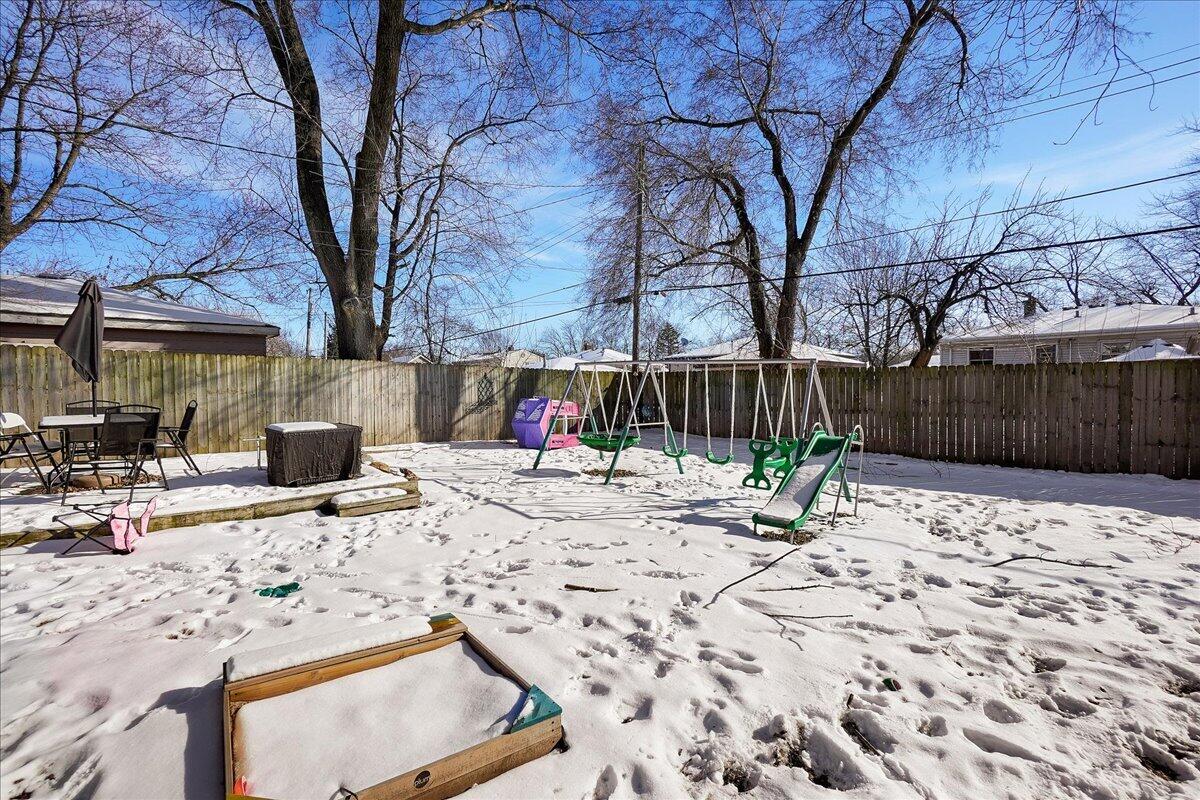 3340 Maple Drive Highland, IN 46322 - Photo 24 of 29 a view of a backyard with a tree