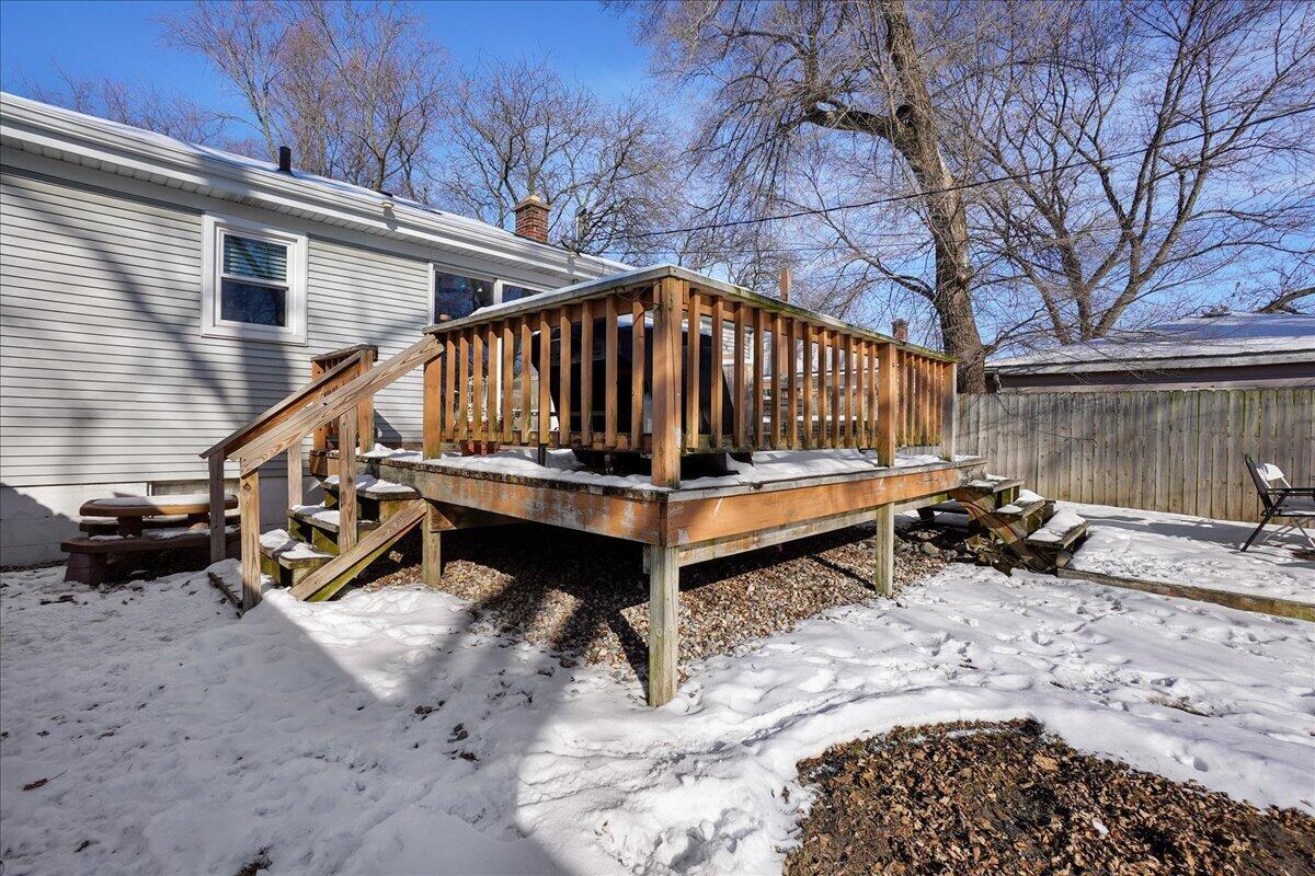 3340 Maple Drive Highland, IN 46322 - Photo 28 of 29 a view of backyard with wooden deck and outdoor seating